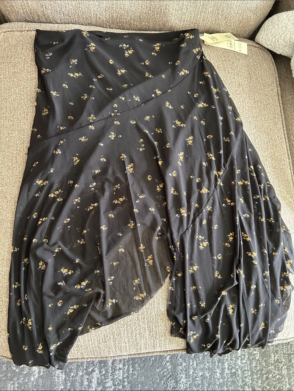 No Boundaries Black Asymmetrical Skirt with Yellow Floral Print